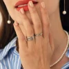 Bague multi infinis acier