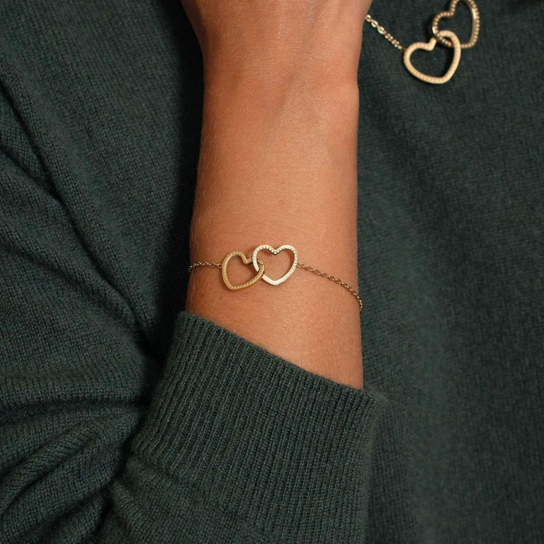 Bracelet cœurs entrelacés acier doré or