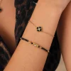 Bracelet Trefle noir acier doré or