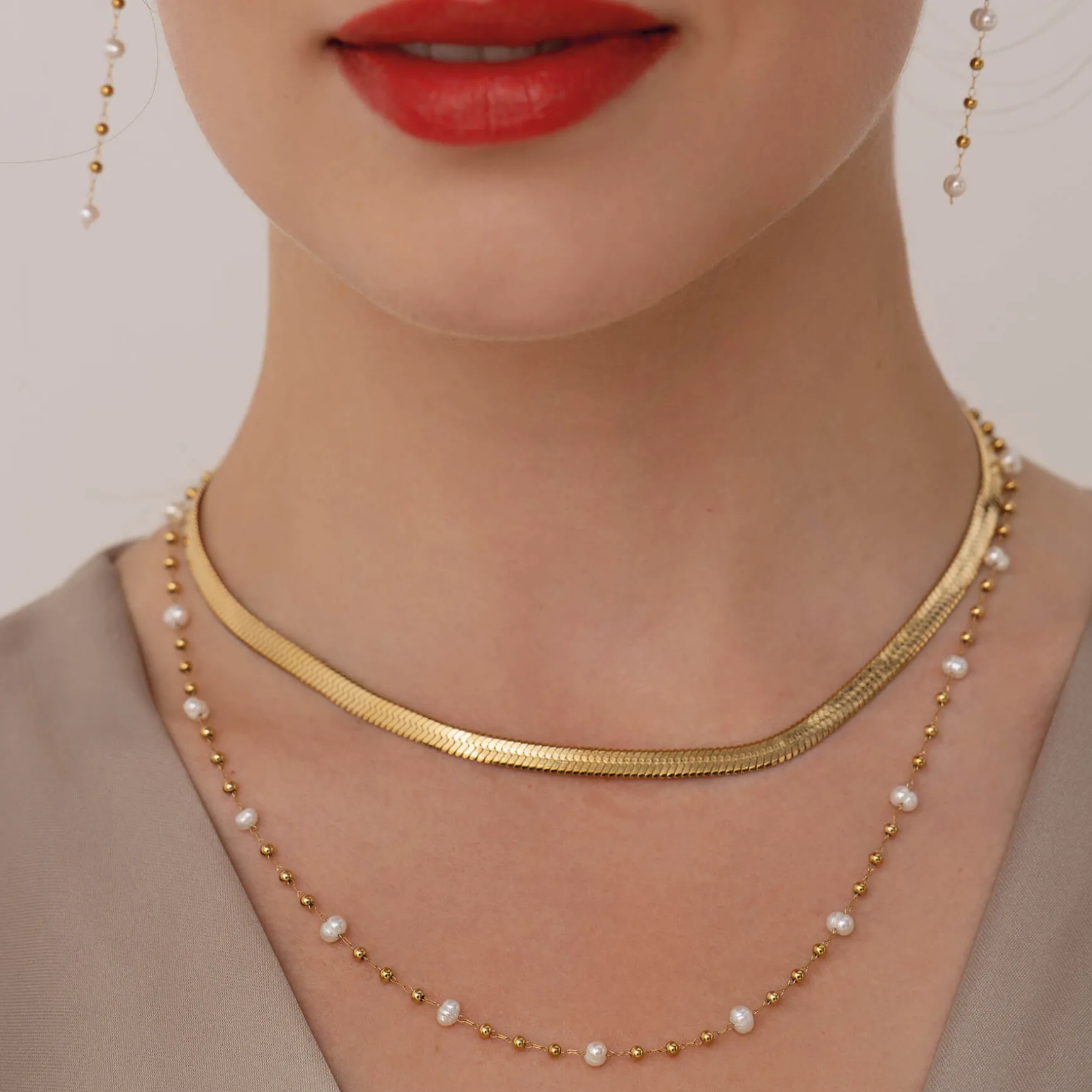 Collier maille plate acier dorée or
