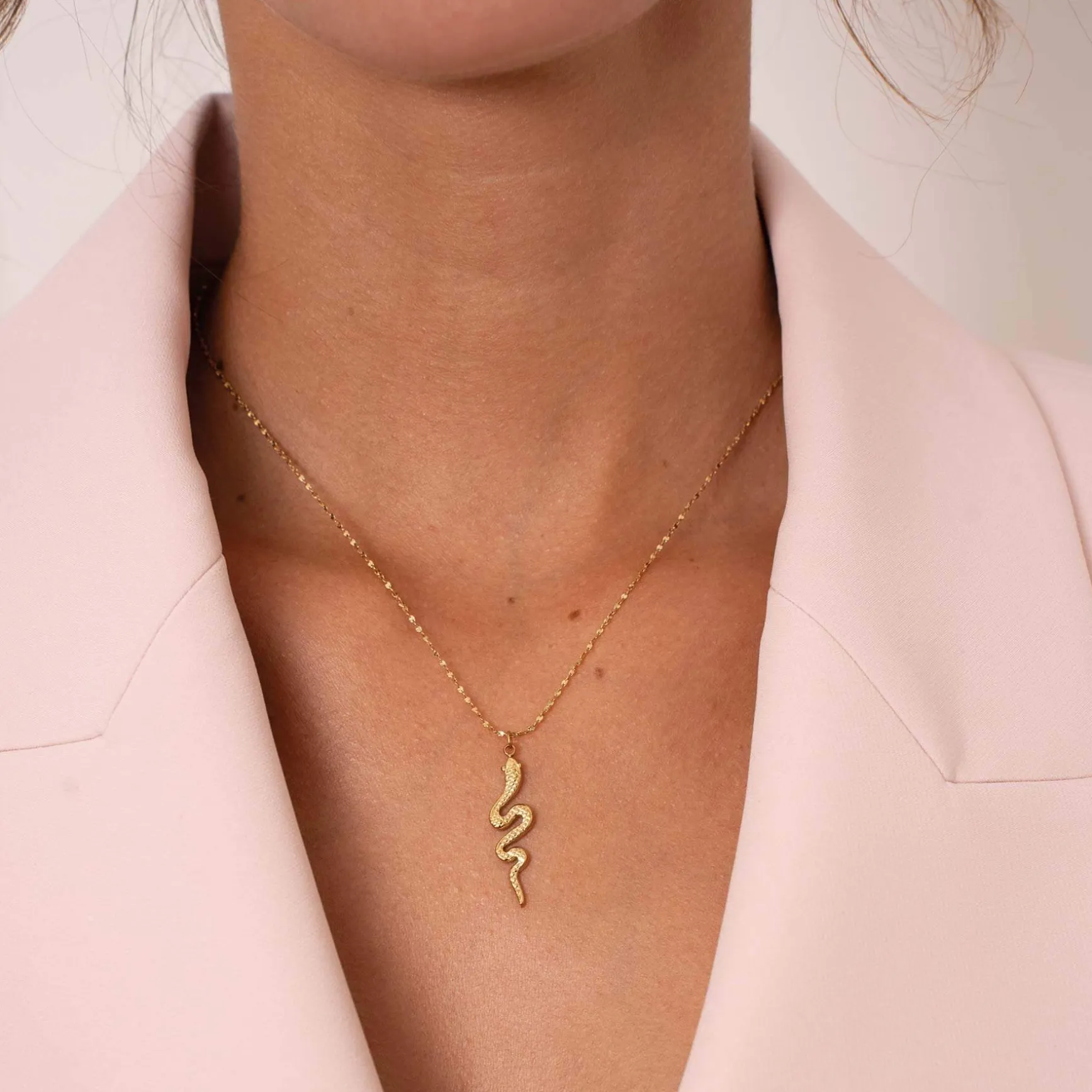 Collier Serpentin acier doré or